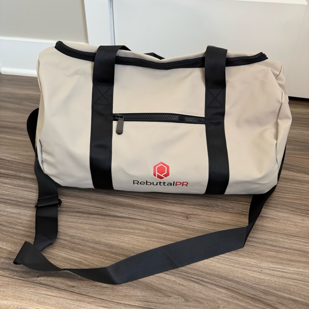 Tan and Black Duffel Bag
